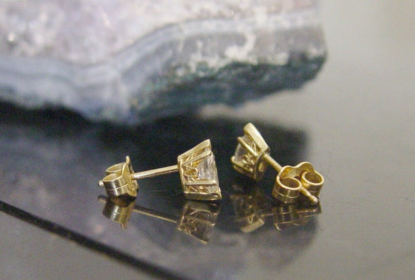 14k yellow gold .60 carat marquise diamond prong set solitaire earrings vs2 i/j
