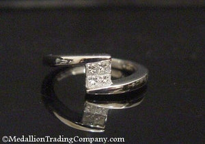 PT 950 White Platinum Invisible Set Princess Cut .40 Carat Diamond Bypass Ring